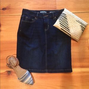 Classic dark wash denim skirt. Never worn